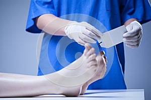 Nurse working in morgue photo