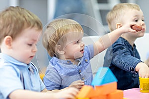 Nursery kids on lesson in preschool