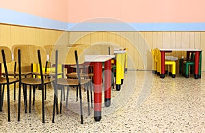 Nursery lunchroom with small chairs and dining table photo
