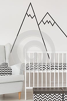 Nursery with white cot