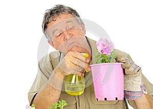 Nurseryman Sprays Seedlings