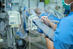 Nurses are checking the function of the hemodialysis machine