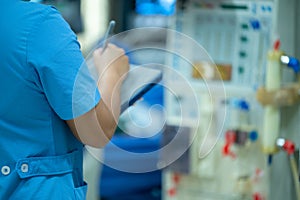 Nurses are checking the function of the hemodialysis machine before use in patients