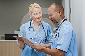 Nurses checking medical reports