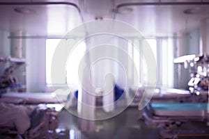 Nurses on duty in the intensive care unit, unfocused background
