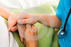 Nurses Helping Elderly photo