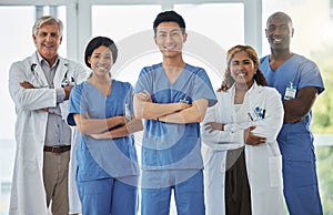 Nurses, portrait and team of doctors with arms crossed standing together in hospital. Face, confident and medical