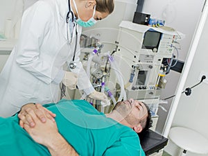 Nurses preparing patient before operation in hospital