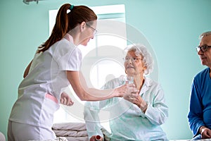 Nursing home concept, taking care of elder people, providing a broad range of long term services to elderly photo