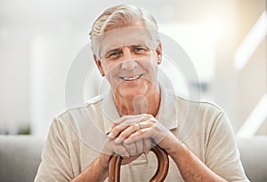 Nursing home, portrait and happy senior man with a walking stick in a living room with positive attitude. Smile, face