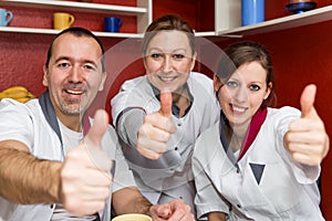 Nursing staff lifting thumbs up