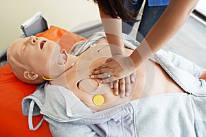 Nursing students are learning how to rescue the patients in emergency. CPR training with CPR doll