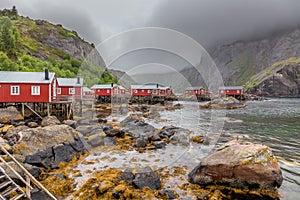 Nusfjord authentic fishing village with traditional red rorbu houses in winter. Lofoten islands, Norway