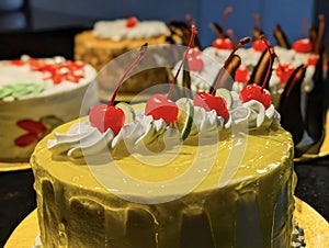 Nut-Crusted Layer Cake with Whipped Cream and Cherry