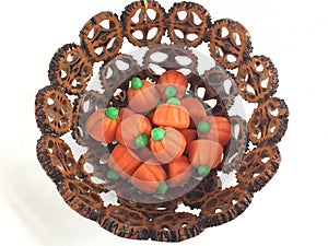 Nut shell bowl with pumpkin candies