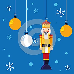 Nutcracker king toy hanging with balls of christmas