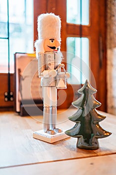 Nutcracker Soldier with a Drum and a Christmas Tree