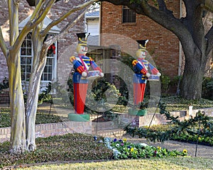Nutcracker Solidiers holding drums standing guard protecting a house in Dallas, Texas