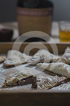 Nutella hand pies on a wooden tray