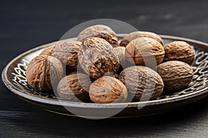 Nutmeg in Black Plate, Myristica Fragrans Fruit, Dry Spicy Nutmeg, Grated Whole Muscat Nut, Nut Meg