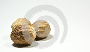 Nutmeg isolated on white background