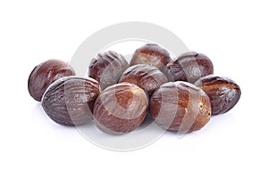 Nutmeg isolated on white background photo