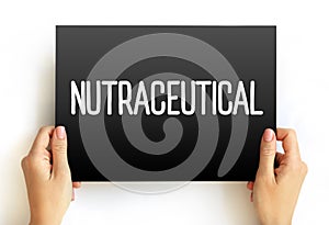 Nutraceutical - pharmaceutical alternative which claims physiological benefits, text concept on card photo