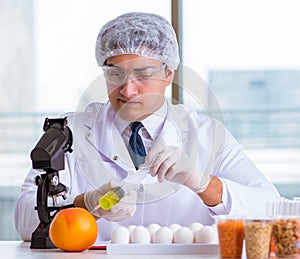 Nutrition expert testing food products in lab