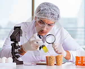 Nutrition expert testing food products in lab