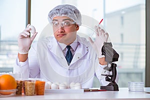 The nutrition expert testing food products in lab