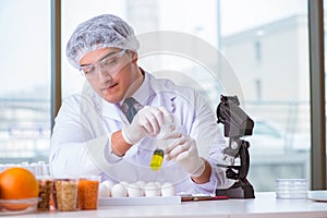 The nutrition expert testing food products in lab