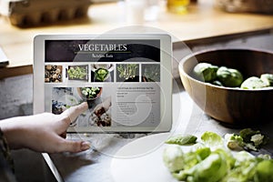 Nutrition facts of fresh vegetable on digital tablet