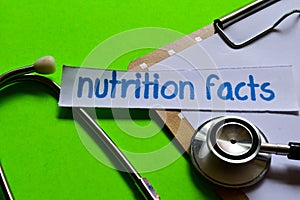 Nutrition facts on Healthcare concept with green background