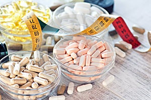 Nutritional supplements in capsules and tablets photo