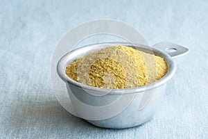 Nutritional Yeast in a Measuring Cup