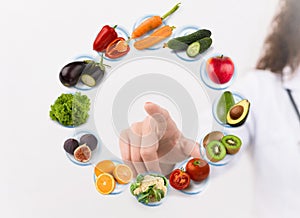 Nutritionist making diet plan on virtual screen photo