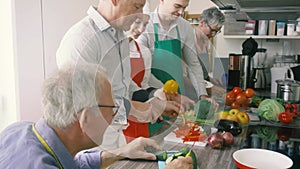 Nutritionist and trainees in a training kitchen