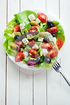 Nutritious fresh salad with feta and olives