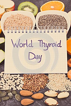 Nutritious ingredients and inscription World Thyroid Day. Healthy food containing vitamins. Problems with thyroid concept