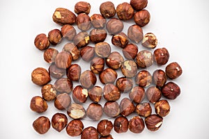 Nutritious nuts, hazelnuts on a white background