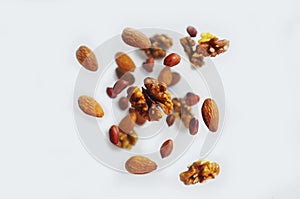 Nuts in the air on a white background, flying nuts. Healthy Brain Food, Diet, Protein, Almonds, walnuts and hazelnuts