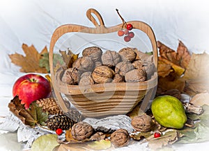 Nuts in a basket, apples and pears
