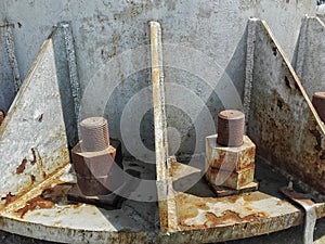 Nuts and bolds on  iron pylon