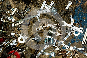 Nuts and bolts on plain background