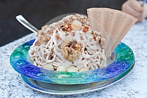 Nuts with ice-cream and cream