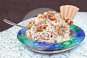 Nuts with ice-cream and cream