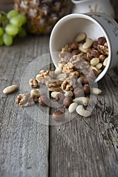 Nuts mix over wooden background. Energy super food. Proteine food. dieting, healthy food. Isolated nuts - almonds