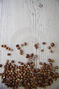 Nuts on wooden background