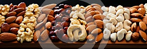 Nutty delights. assortment of nuts and dried fruits on sleek black background, side view