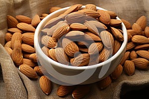 Nutty grace almonds arranged on eco canvas napkin, nature inspired aesthetics